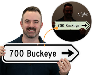 Arrow sign with address