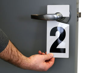 Numbered door hang tags are easy to reuse
