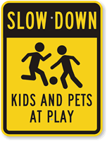 Slow Down Kids And Pets At Play Sign